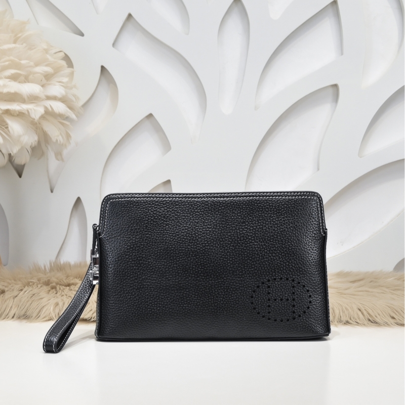 H**mes clutch bags